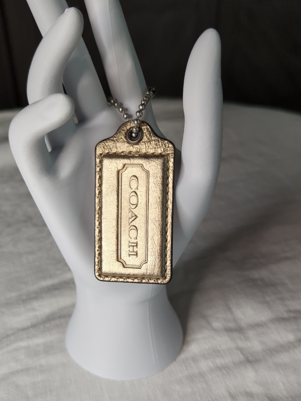 (0015) COACH Metallic Gold Leather Hang Tag